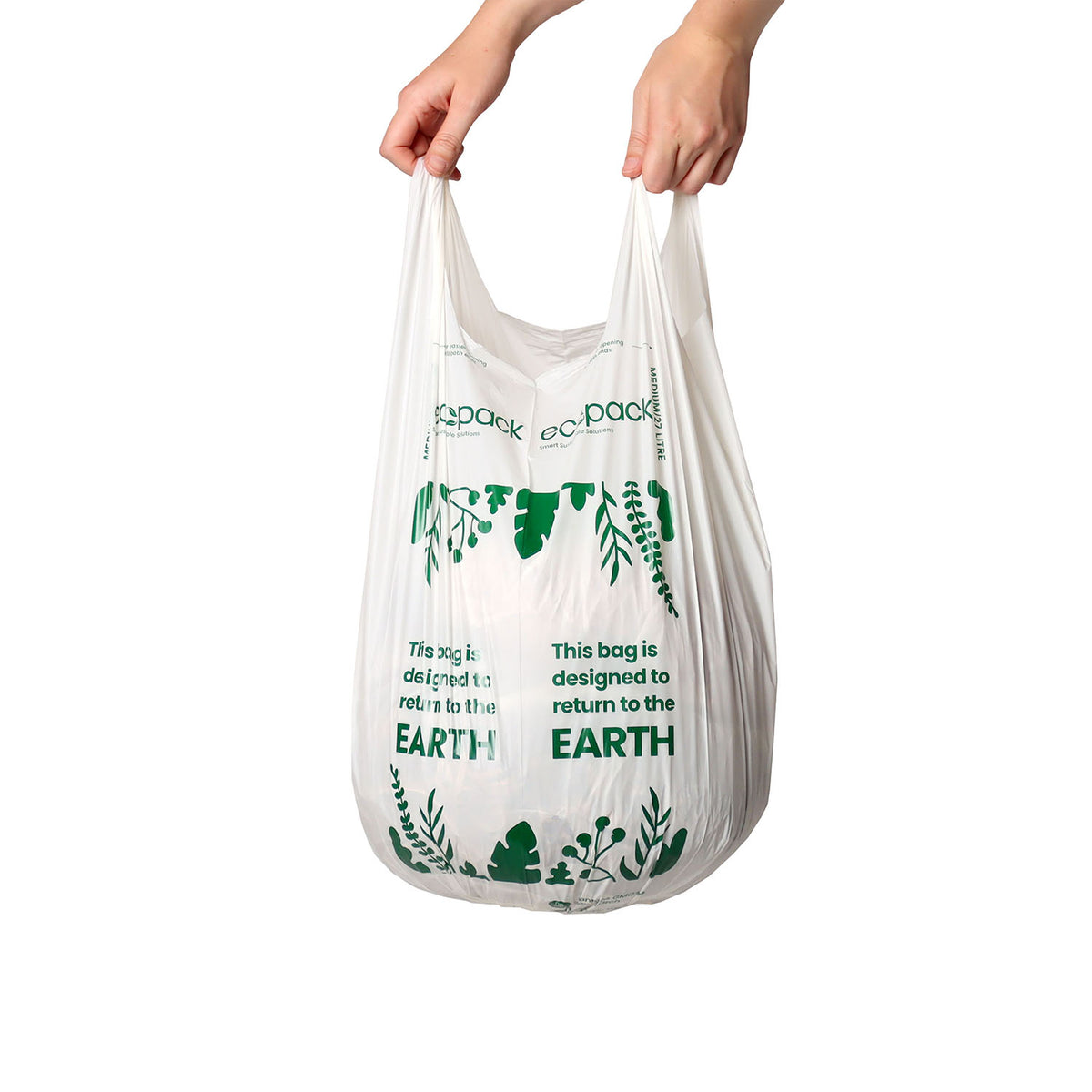 Hand holding an Ecopack 27L compostable bin liner to show size and thickness
