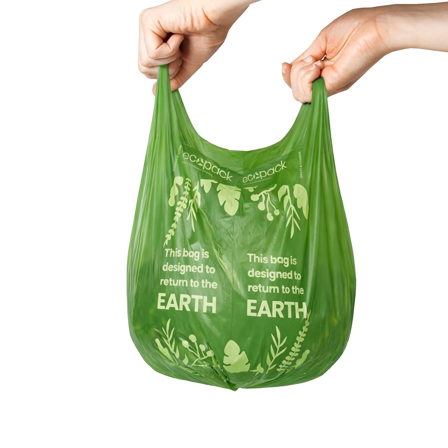 Hands holding 8L green compostable bin liners bag with tie handles
