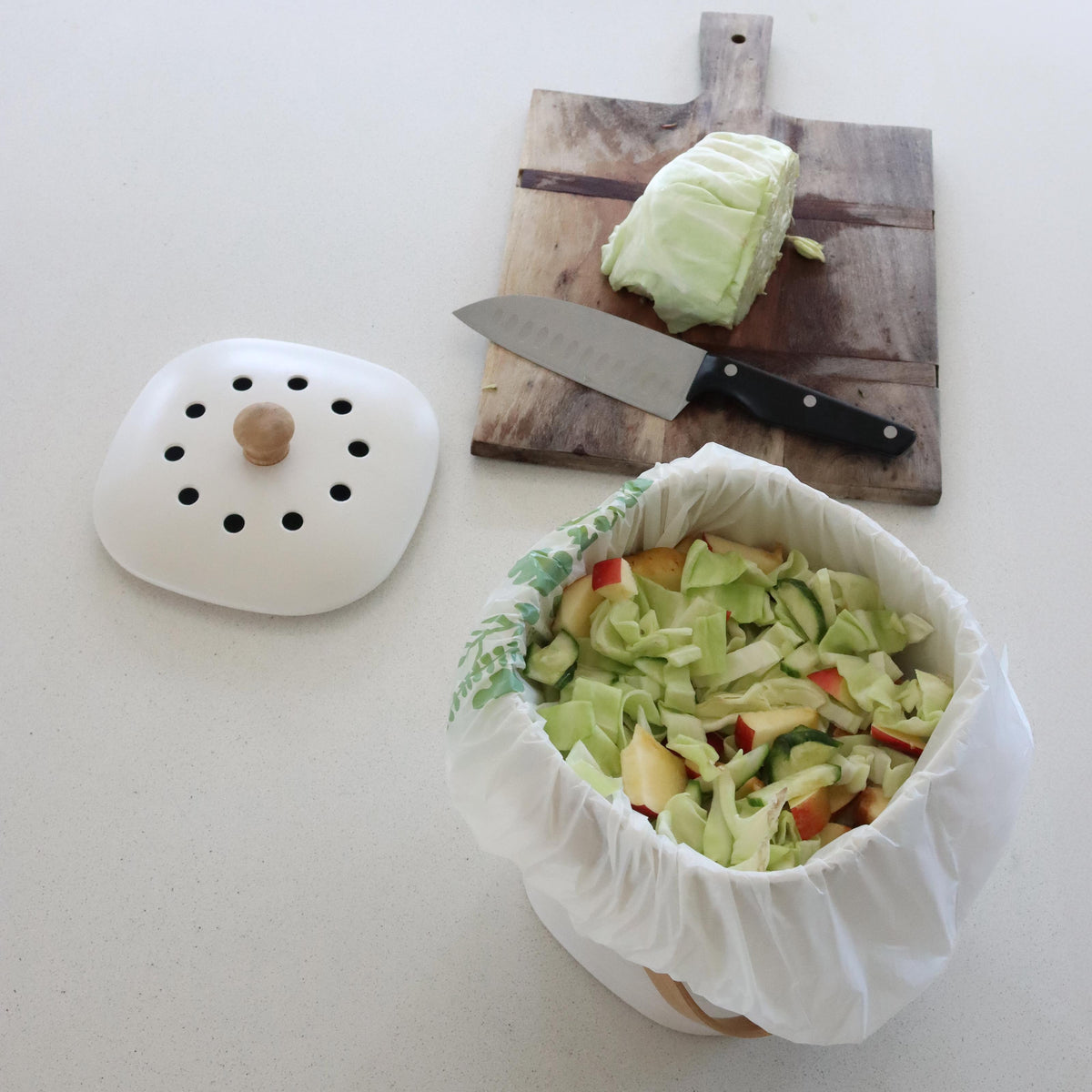 Bamboo Caddy with food scraps on kitchen bench