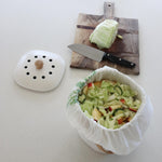 Bamboo Caddy with food scraps on kitchen bench