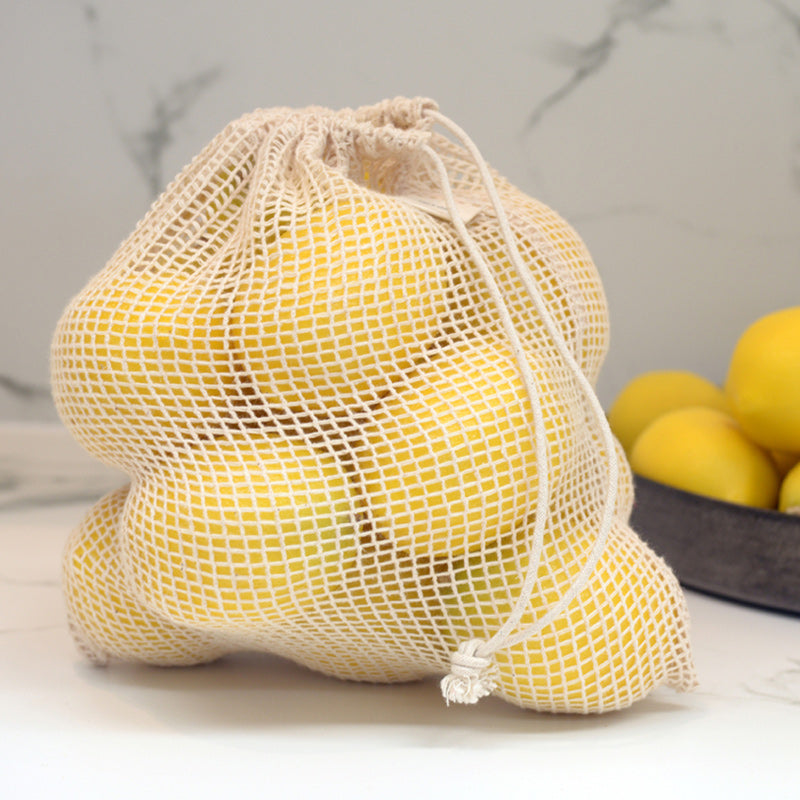 Lemons in organic cotton string bag