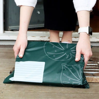 Holding the A4 Compostable Courier Bag