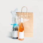 Ecopack Medium Twisted Handle Paper Bag next to products