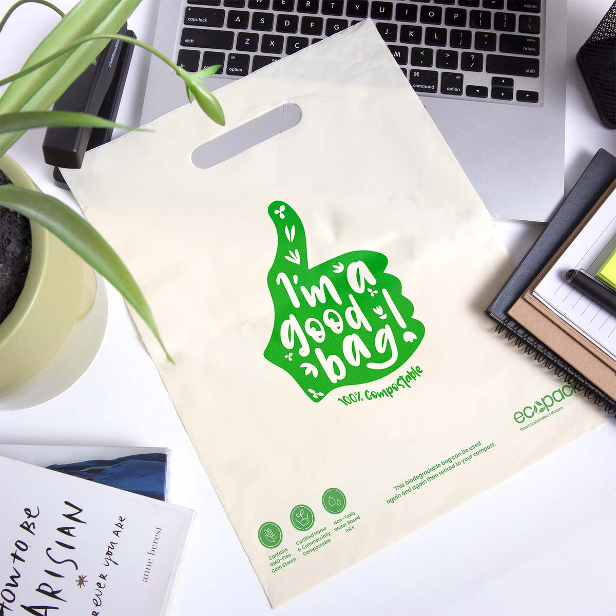 Ecopack Small Compostable Punched Handle Retail Bag in use