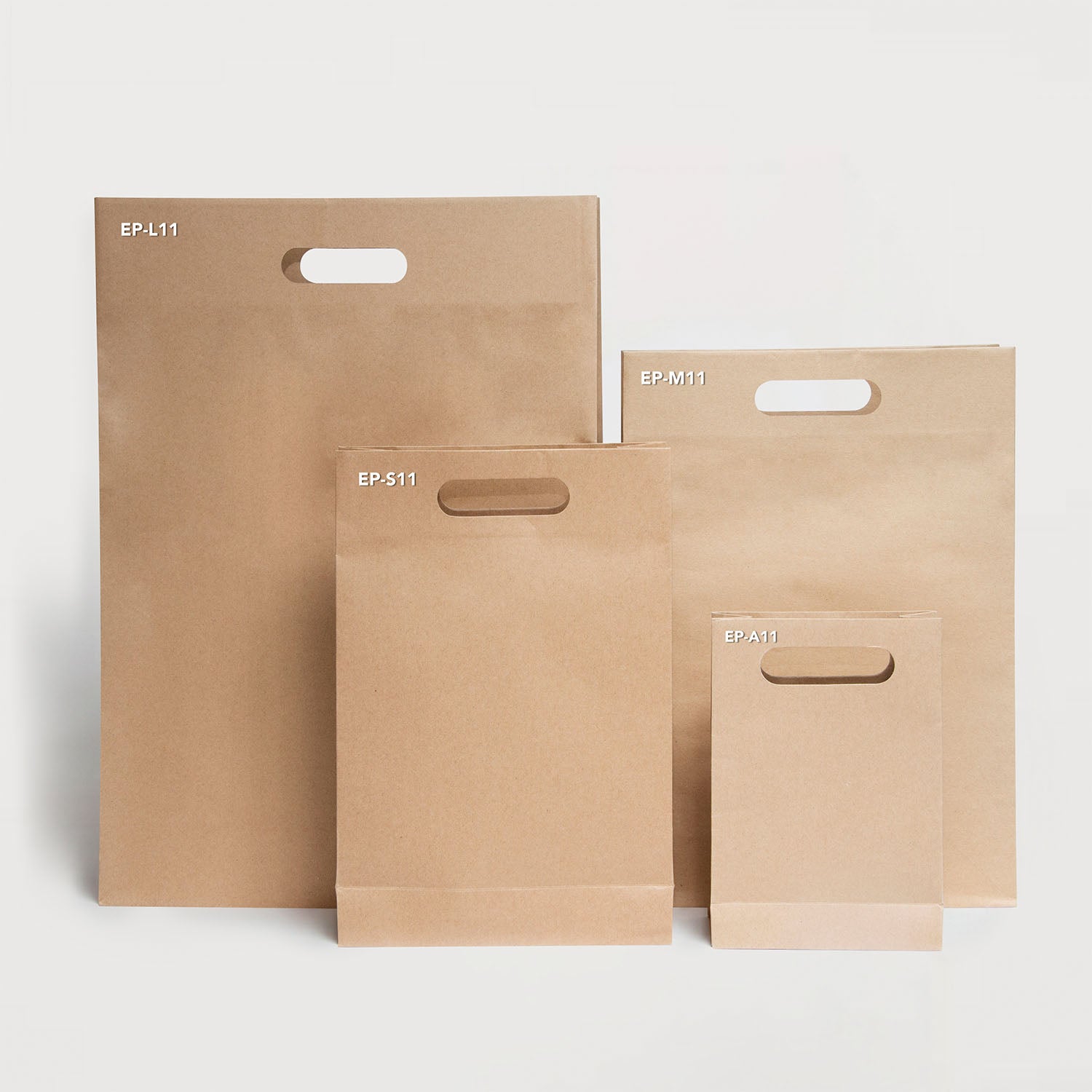 Punched Out Handle Paper Bags