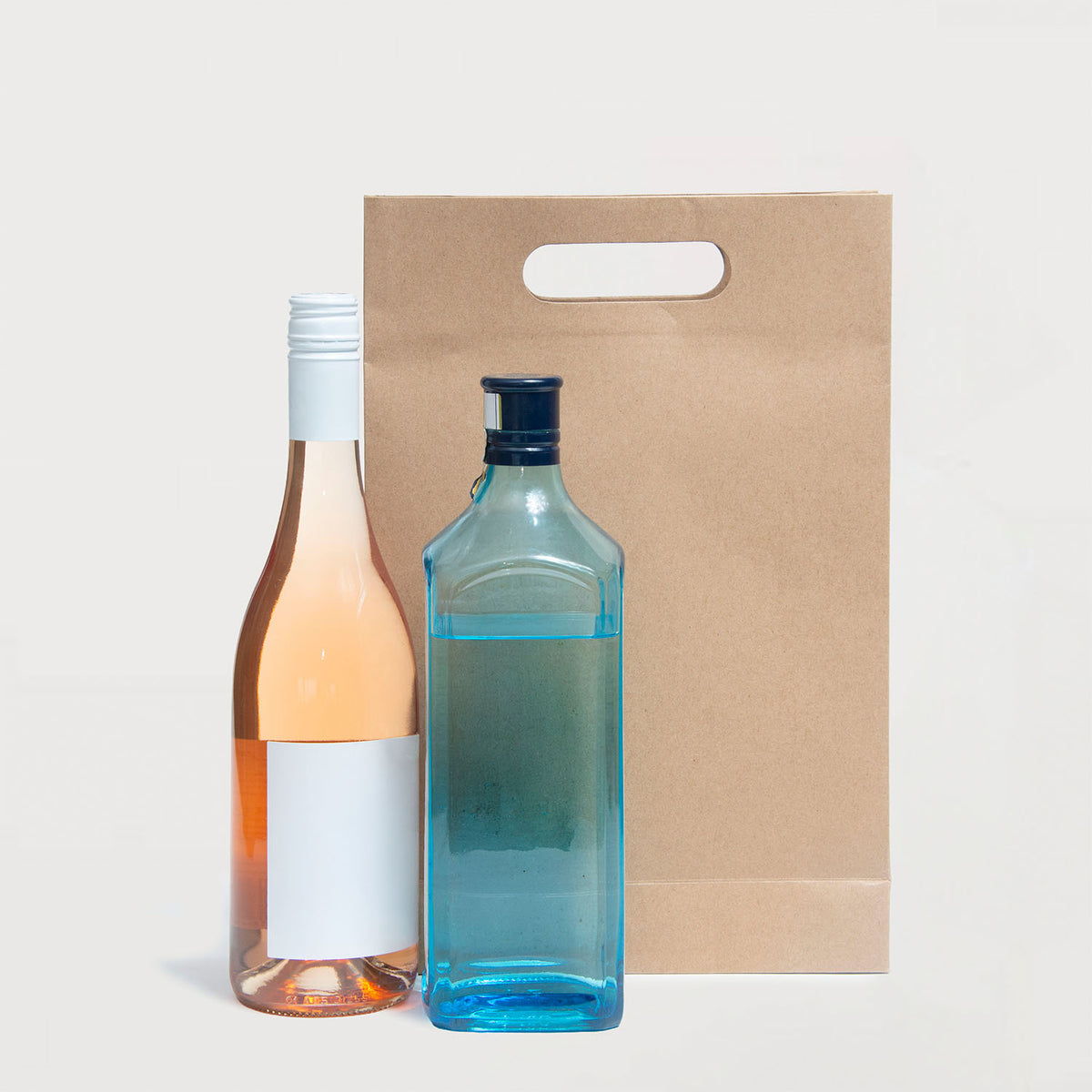 Ecopack Small Punched Out Handle Paper Bags next to products
